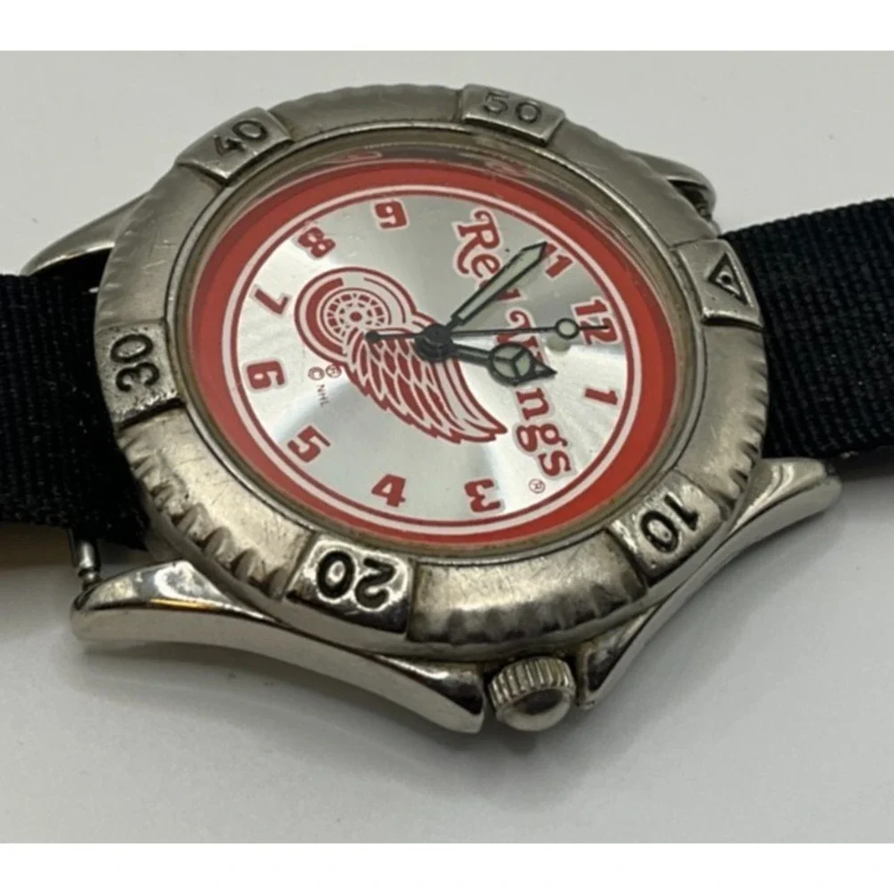 Official NHL Detroit Red wing mens watch, some light wear/age, looks & runs good